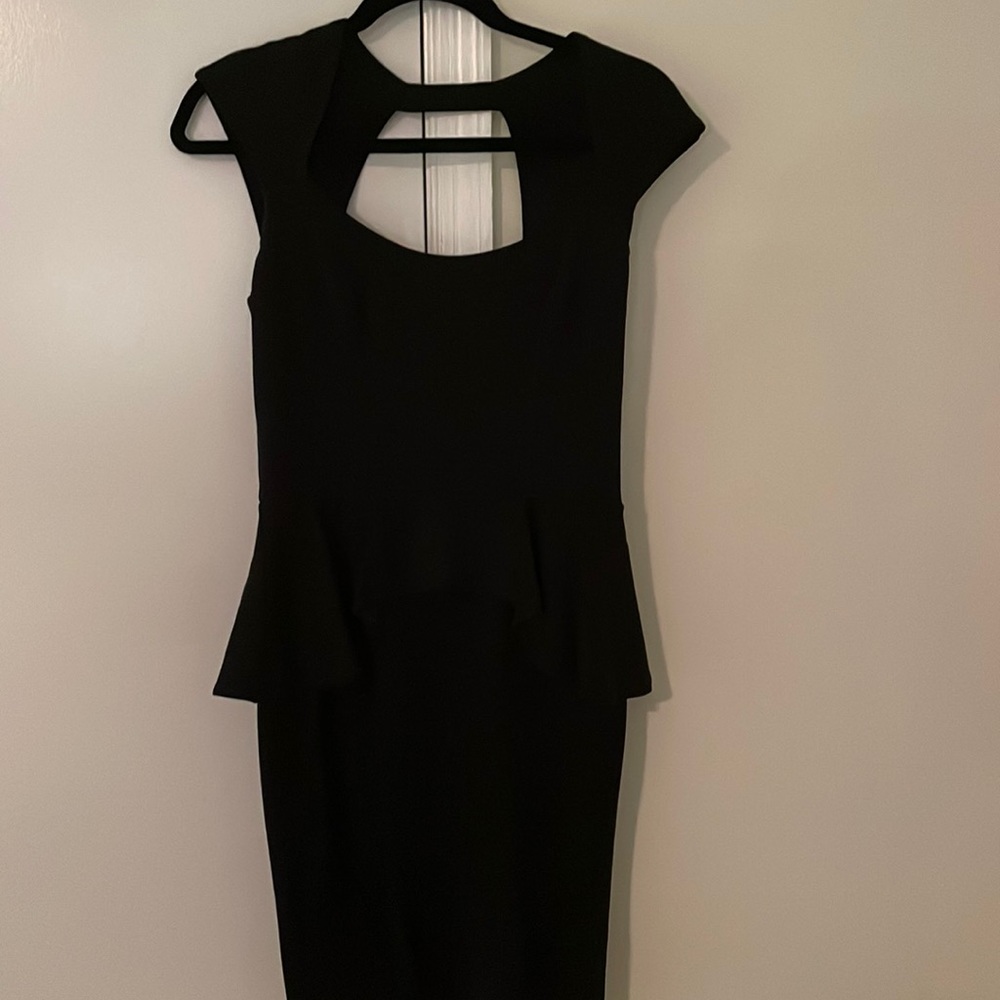 Black peplum Bebe dress
